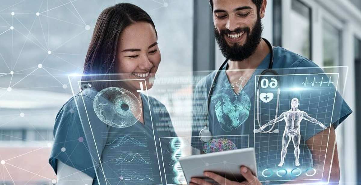 Two nurses reviewing a digital medical chart